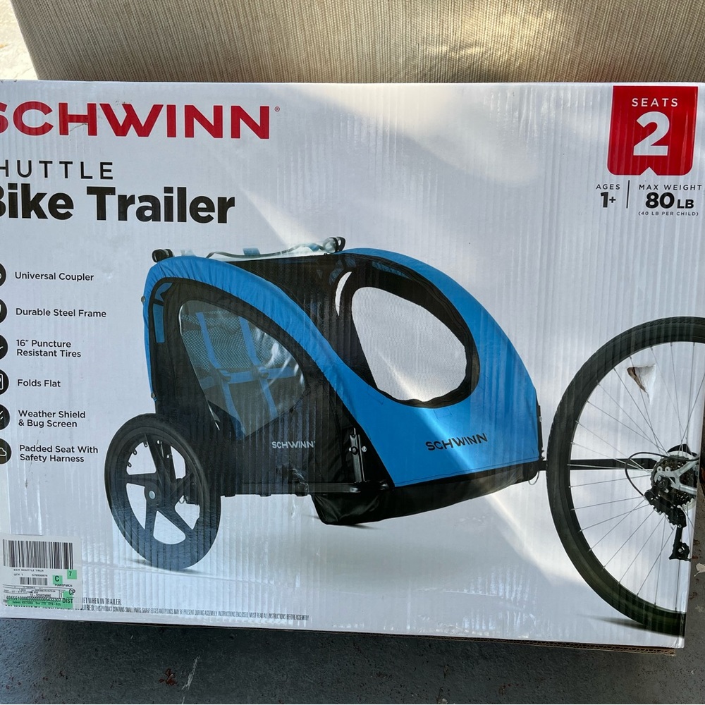 New bike trailer inside a box. $95.00
